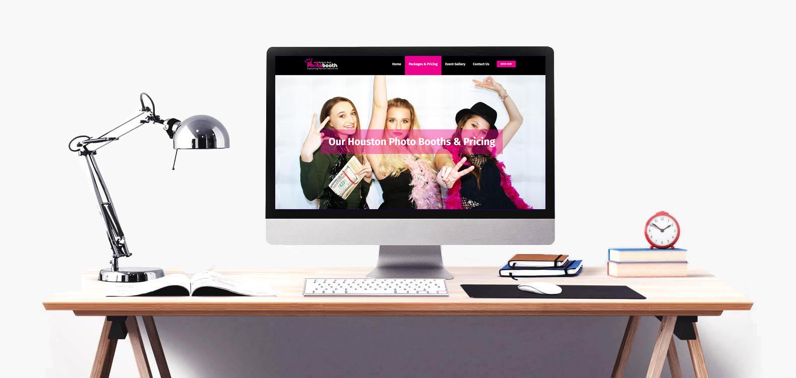 Perfect Shot Photo Booth's website on a desktop