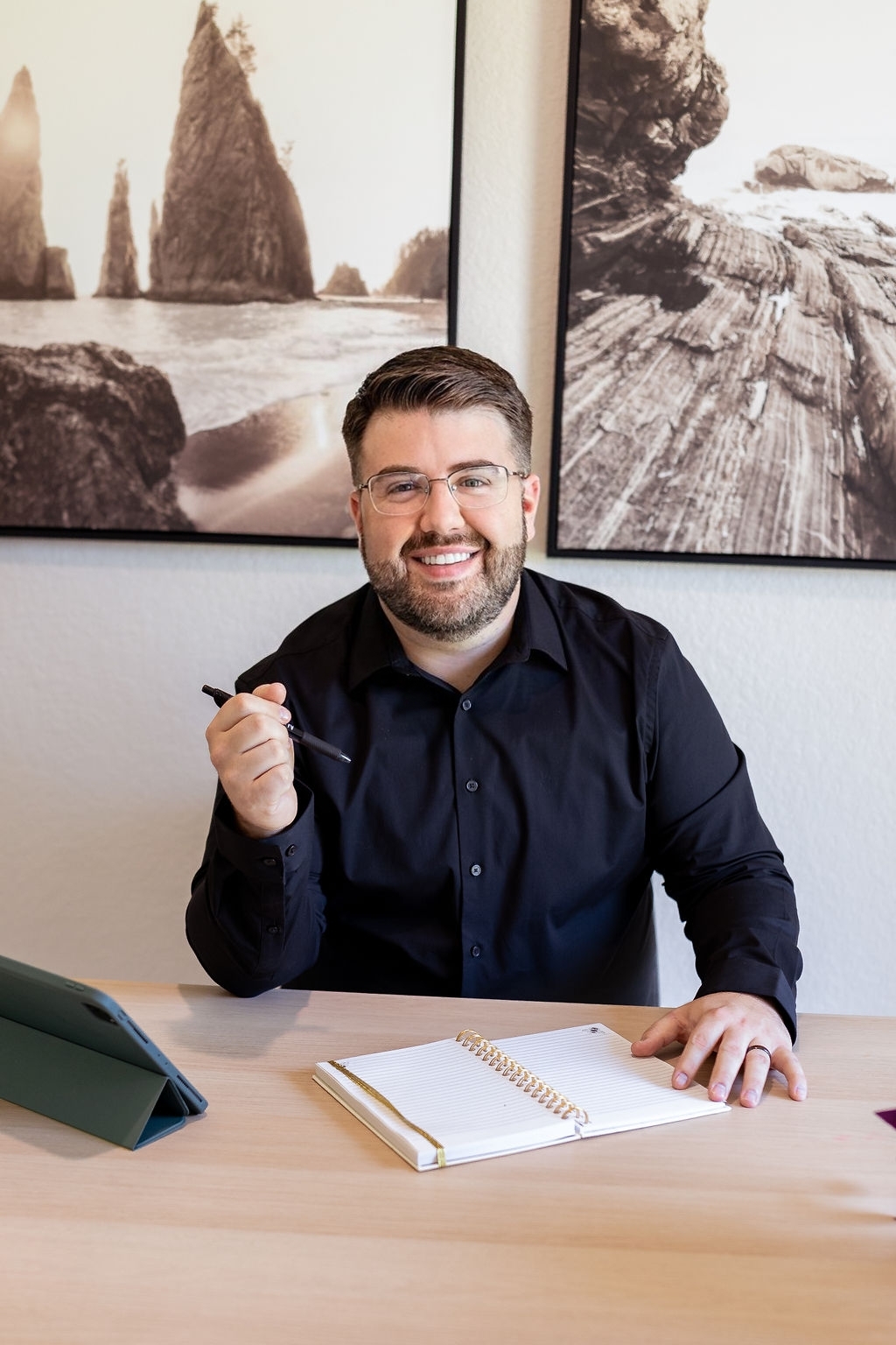 photo of Jacob Shireman at a desk, the founder of Hi5 Biz Solutions