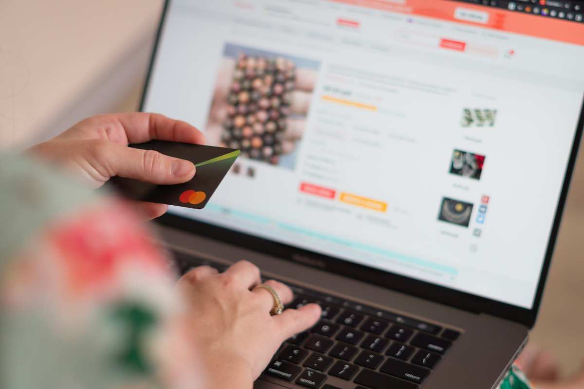 photo of someone clicking on an online ad